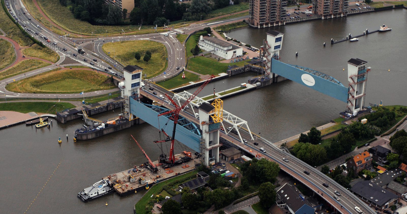 Aerial view of a movable water barrier and bridge infrastructure project
