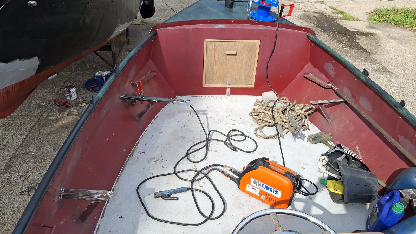 Open tender boat interior during welding and fabrication work