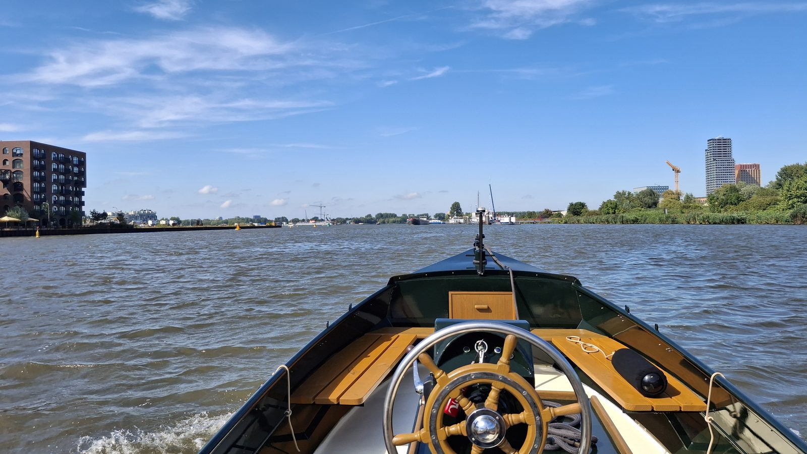 View from the helm of the restored tender boat, underway on the water